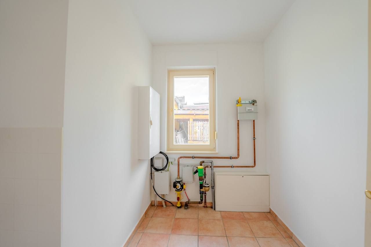 Ebenerdiger Bungalow mit Kamin, 2009 – Hauswirtschaftsraum mit Haustechnik
